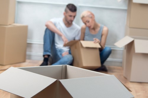 Professional movers handling furniture in Lambeth