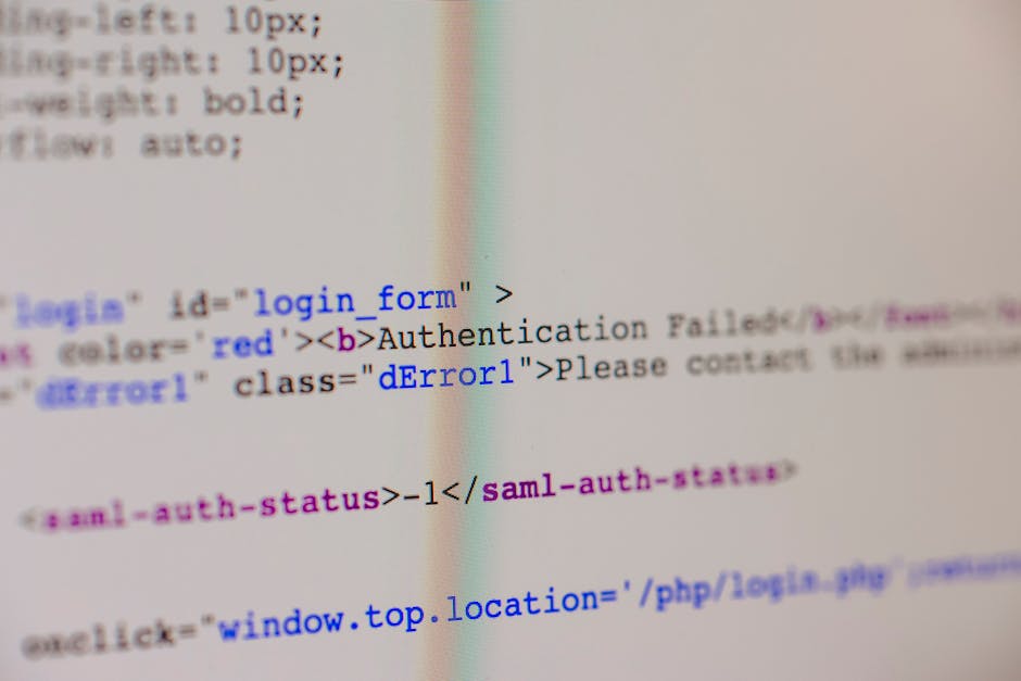 Close-up view of a computer screen displaying lines of HTML and JavaScript code in blue and white text, part of a website's technical files. The code includes stylesheet links and script includes in a